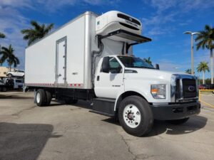 Front Side view New 2026 Ford F-750 with 26 foot Wabash Refrigerated box and 3500 pound liftgate